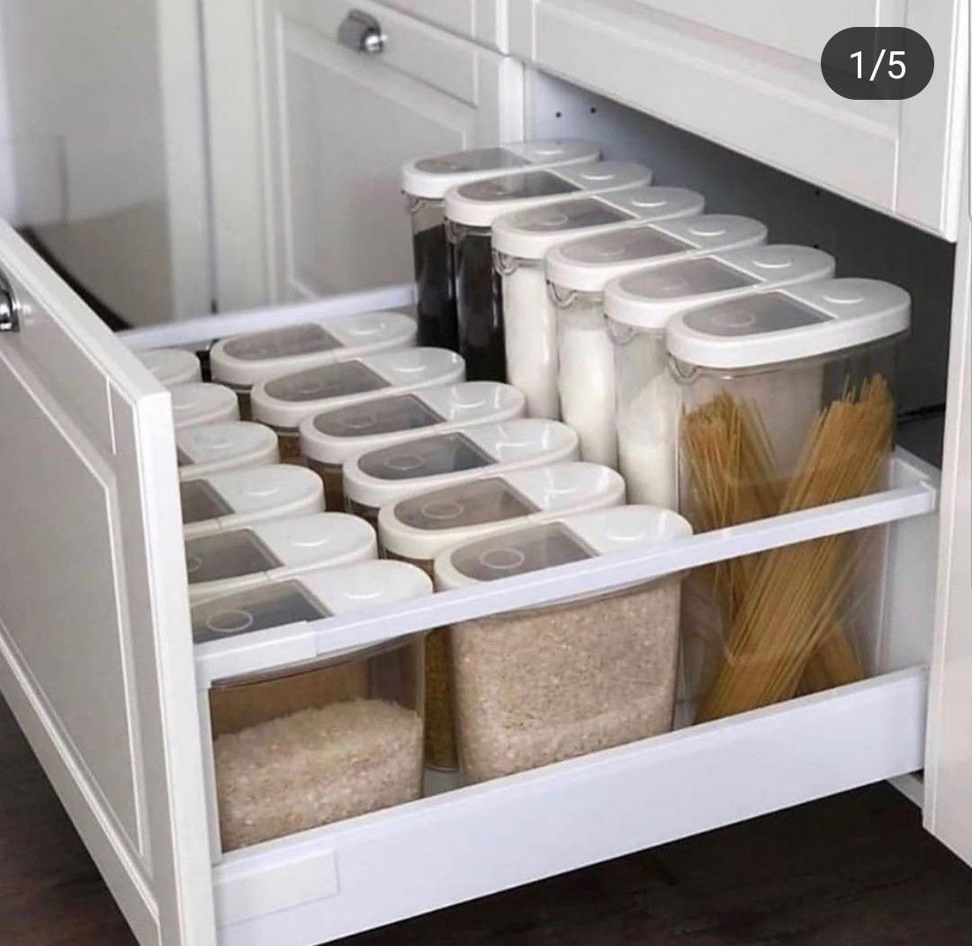 Organised pull-out drawer with pantry jars