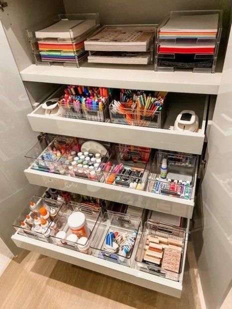 Organised shelf with labelled storage bins